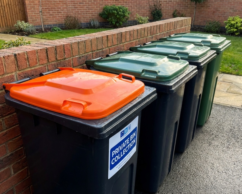 Recycling and general waste bins on a East Preston street